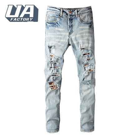 Amiri Ripped Design Jeans Light Blue